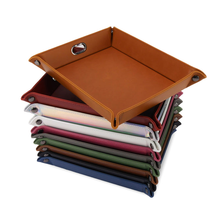 Stack of assorted valet trays with a rawhide tray on top.