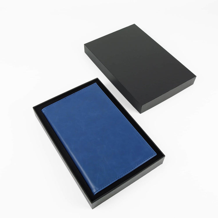 Black journal notebook displayed in an open black presentation box.