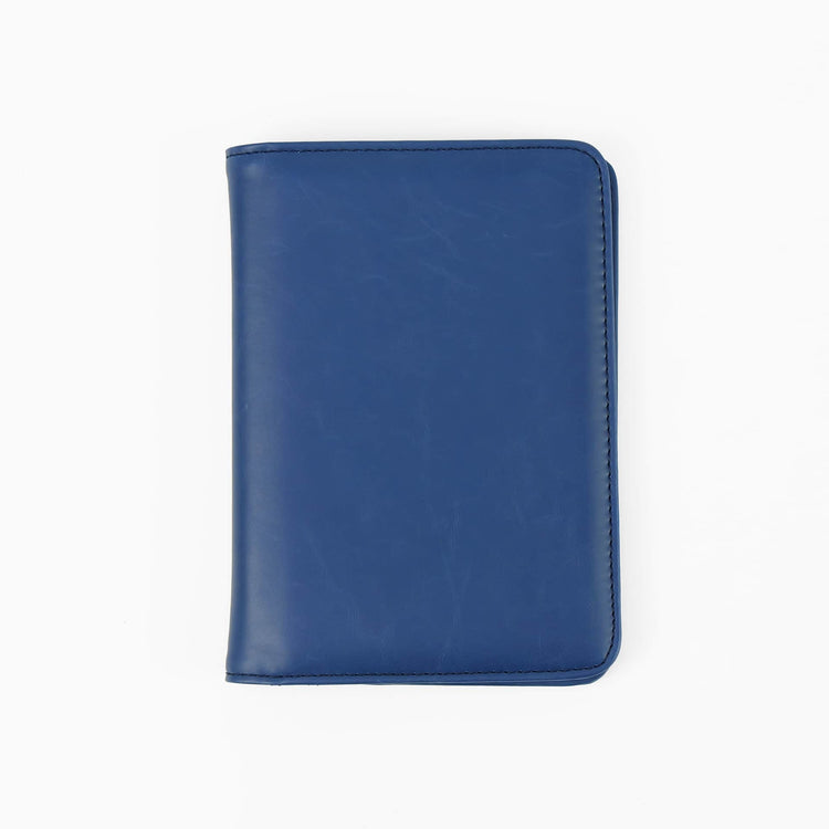 Blue passport wallet shown closed against white.