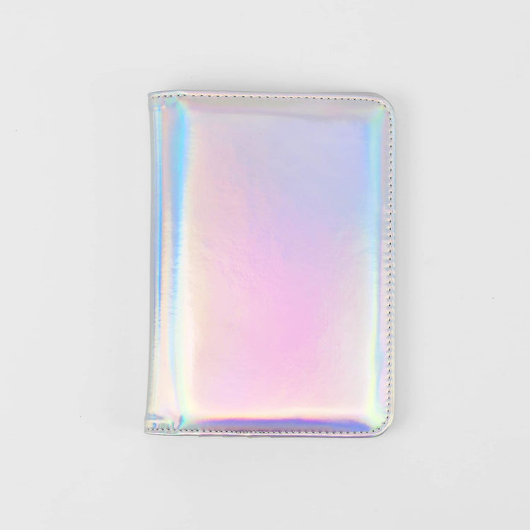 Holographic rainbow passport wallet shown closed against white.