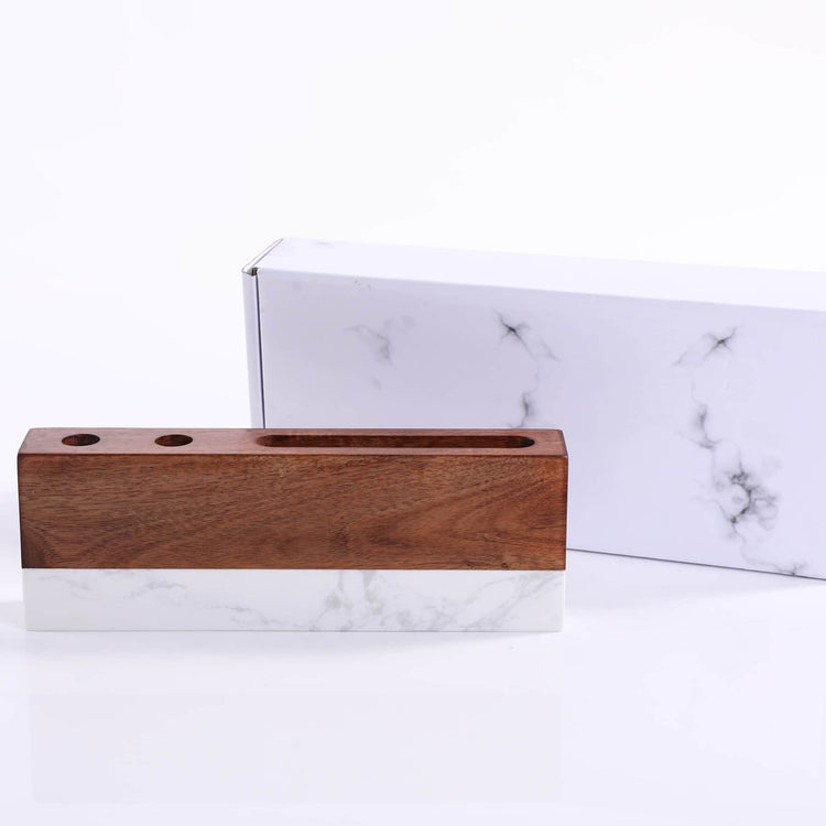 Desk organizer displayed in front of its marble-patterned gift box.