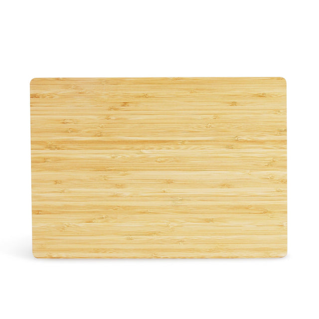 Rectangular bamboo cutting board shown straight on against white.