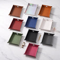 Ten valet tray color options arranged together on a white surface.