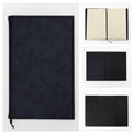 Black journal notebook shown closed with cover and page details.