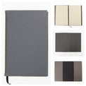 Gold journal notebook displayed in an open black presentation box.