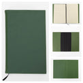 Gray journal notebook displayed in an open black presentation box.