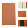 Pink journal notebook displayed in an open black presentation box.