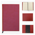 Rawhide journal notebook displayed in an open black presentation box.
