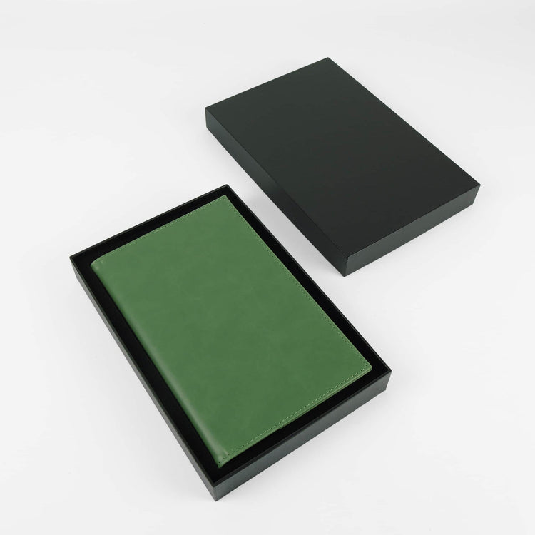 Gray journal notebook shown closed with cover and page details.