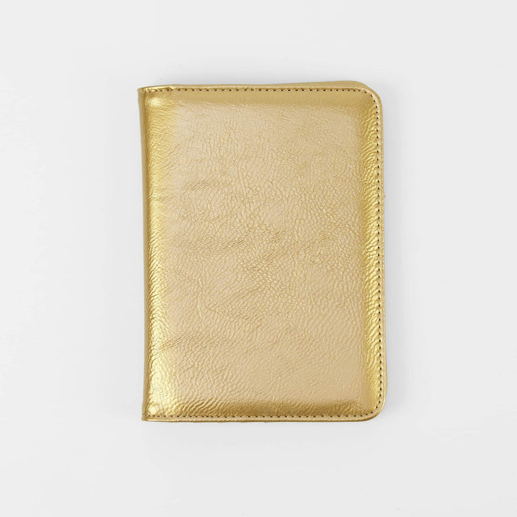 Gold passport wallet shown closed against white.