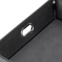 Close-up of the cable-routing opening on a black valet tray.