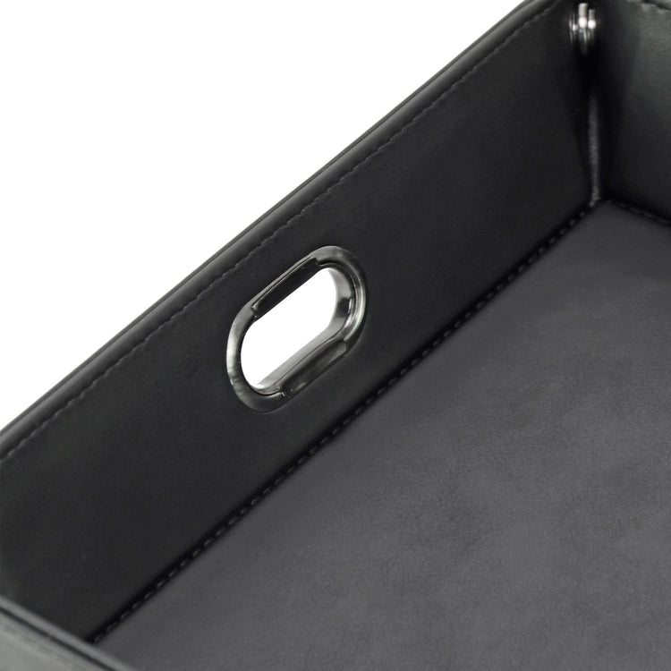 Close-up of the cable-routing opening on a black valet tray.