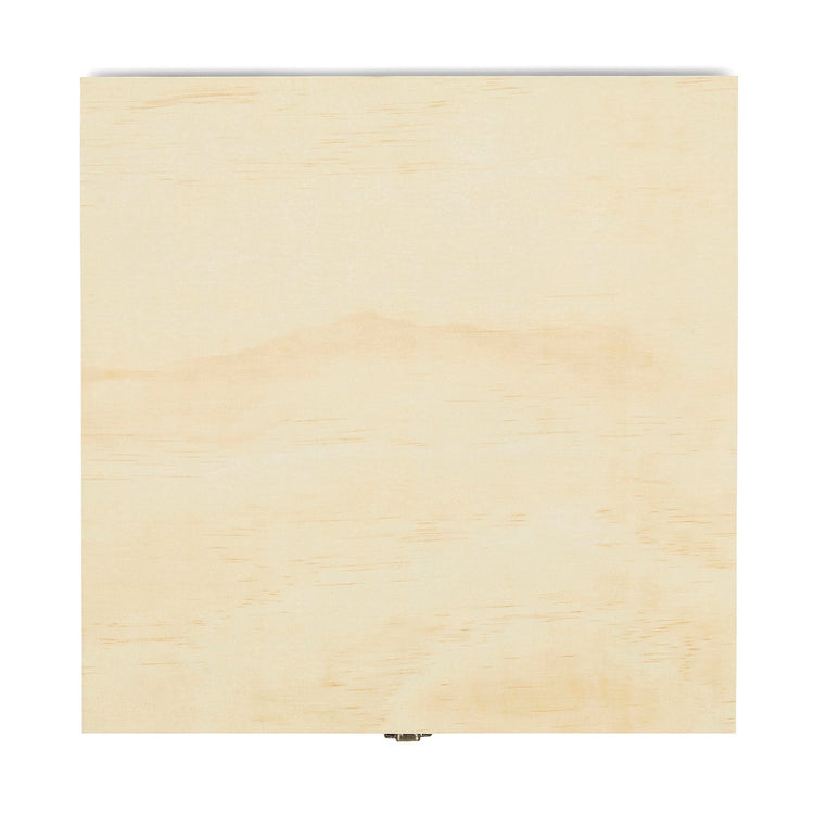 Close-up of the natural wood grain across the box lid.