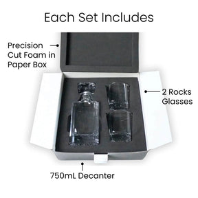 Square whiskey decanter and two rocks glasses in a fitted presentation box.