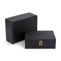 Black medium memory box displayed with its presentation box.