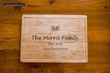 Personalized bamboo cutting board engraved family name mockup