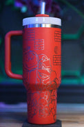 a red coffee cup with a red lid