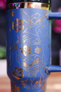 a close up of a blue coffee cup on a table