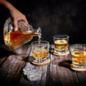 Whiskey Decanter - Triangle - 650ML — decanter pouring into glass
