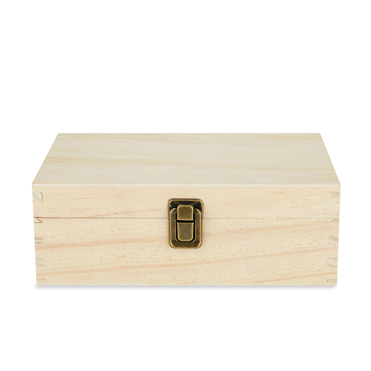 Small natural wood memory box shown closed against white.