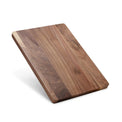Walnut cutting board shown from an elevated three-quarter angle.