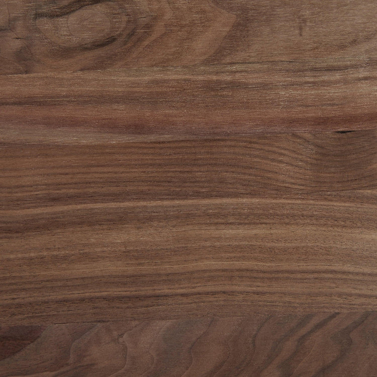 Close-up of the rich natural grain on the walnut board.