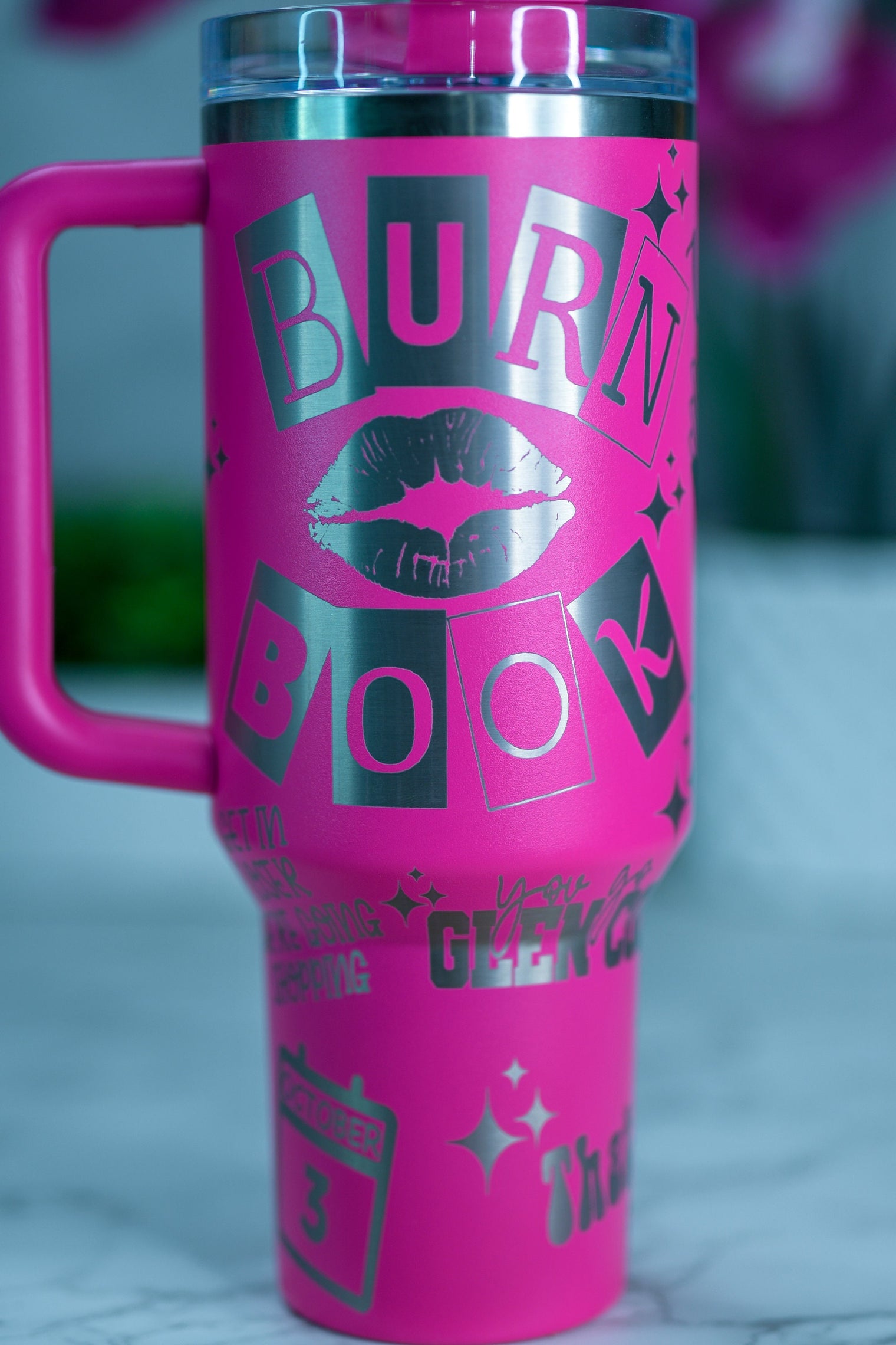 a pink coffee mug with the words burn on it