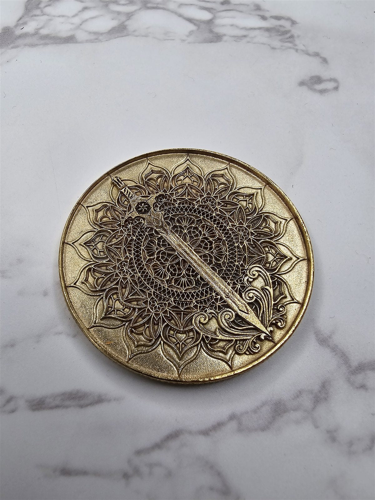 Engraved metal medallion